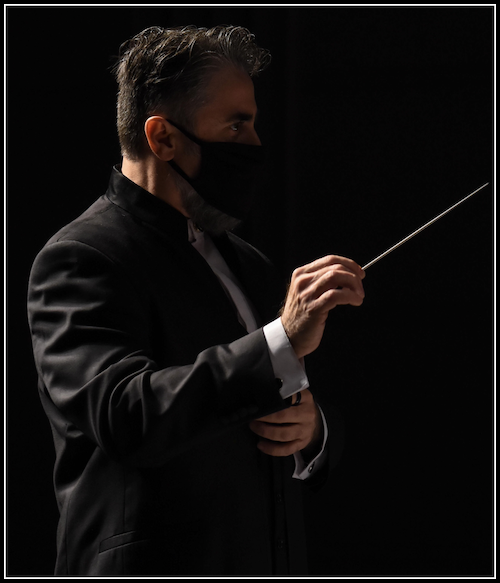 Nikk Pilato conducting during a concert, October 2020