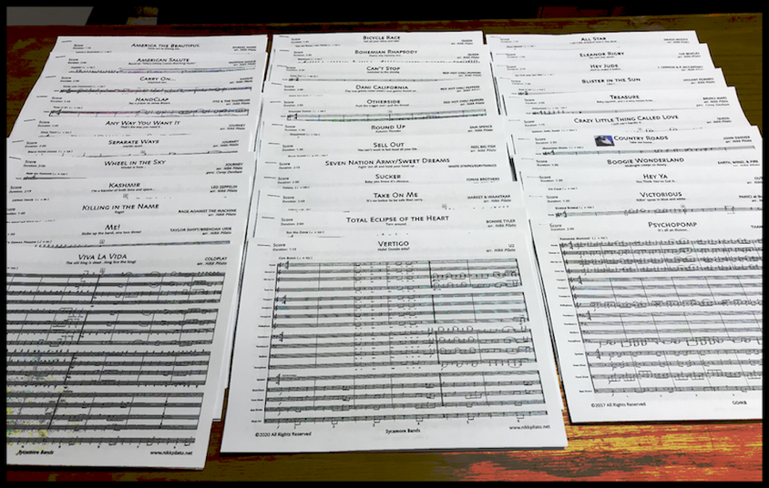 Marching Band Arrangements arranged on a table